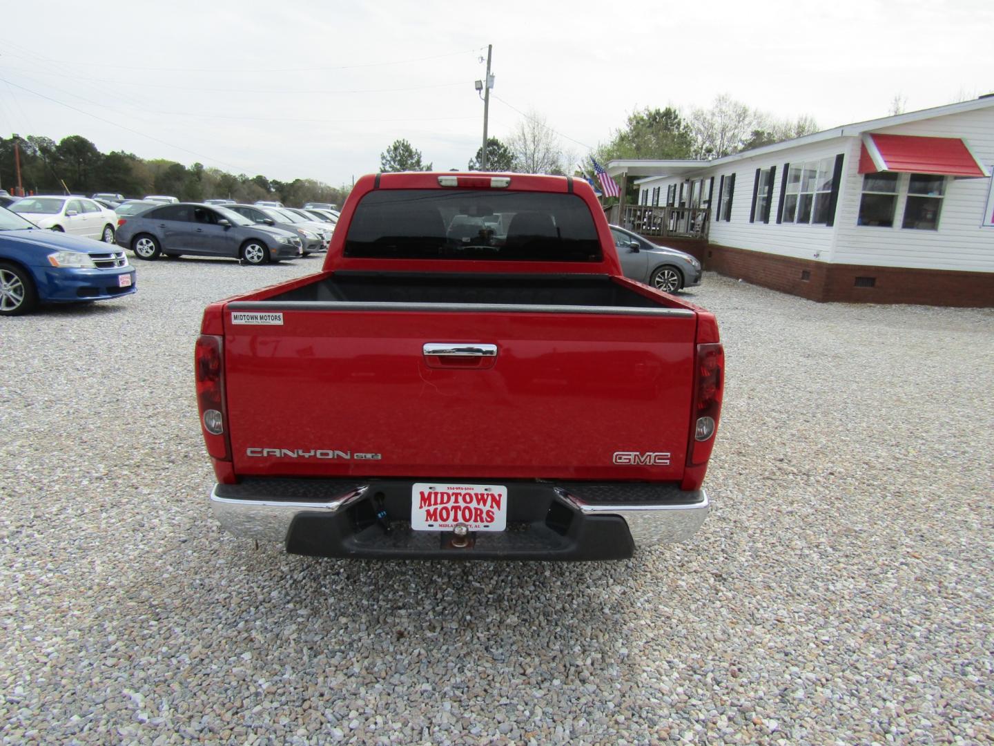 2012 Red /Gray GMC Canyon SLE Crew Cab 2WD (1GTD5MF9XC8) with an 2.9L L4 DOHC 16V engine, Automatic transmission, located at 15016 S Hwy 231, Midland City, AL, 36350, (334) 983-3001, 31.306210, -85.495277 - Photo#6